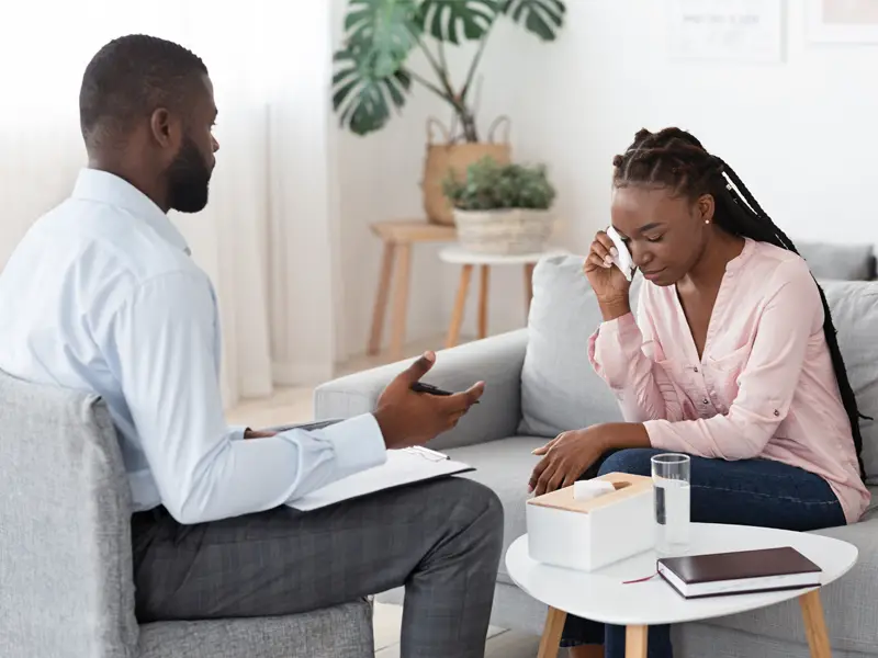 Haven of Wellness Centre - Coach Speaking to Client